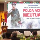 Sekda Aceh M. Nasir menyampaikan sambutan saat menghadiri peluncuran buku Polda Aceh Meutuah karya Dr. Nurlis Effendi di Gedung BSI Landmark Aceh, Banda Aceh, Rabu (3/6/2026). Foto: (Humas Polda Aceh).