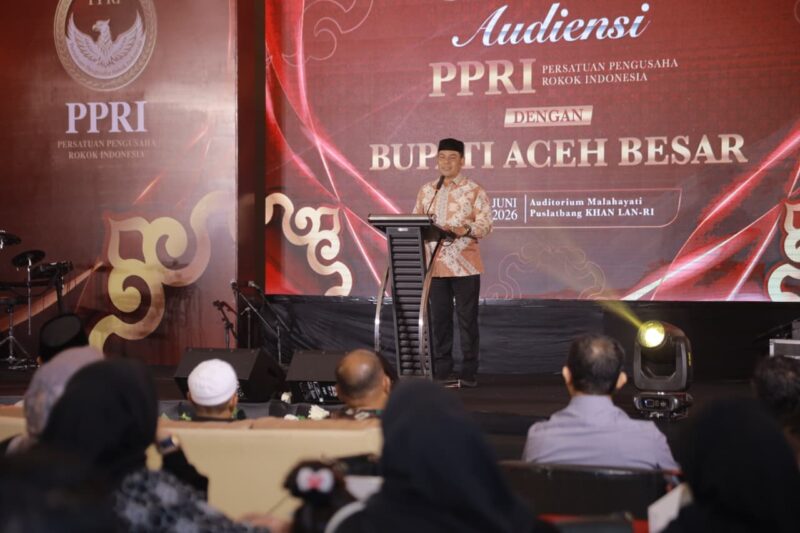 Bupati Aceh Besar H Muharram Idris menyampaikan sambutannya dalam acara audiensi dengan PPRI Pusat yang berlangsung di Auditorium Malahayati Puslatbang KHAN LAN RI, Sabtu (27/06/2026).
