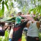 Evaluasi jenazah seorang wanita muda di Sungai Krueng Aceh.Foto:(Humas Polresta Banda Aceh)