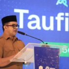 Plt Sekretaris Daerah Aceh, Taufik, dalam Aceh Economic Development Forum (AEDF) 2026 yang digelar PT Pembangunan Aceh (PEMA) Perseroda di Hermes Hotel Banda Aceh, Selasa (6/10/2026).